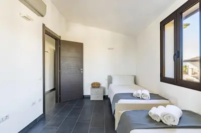 Letto o letti in una camera di Lighthouse Holiday Home