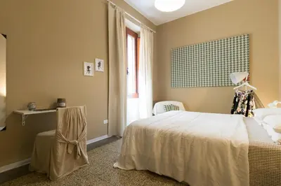 Letto o letti in una camera di BluLassù City Center Rooms