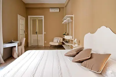 Letto o letti in una camera di BluLassù City Center Rooms