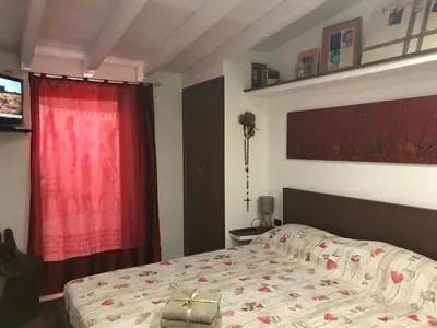 Letto o letti in una camera di Deliziosa casetta Calasetta