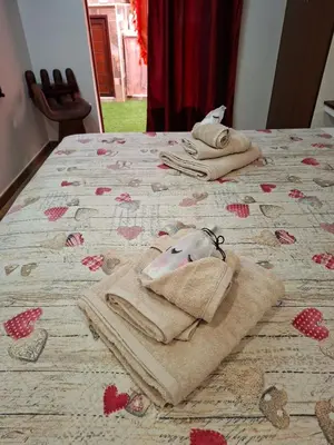Letto o letti in una camera di Deliziosa casetta Calasetta