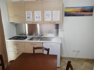 Cucina o angolo cottura di B&B Acquamarina Villasimius