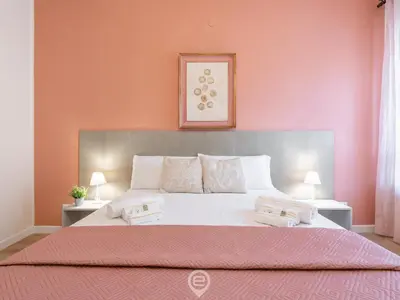 Letto o letti in una camera di Cagliari Diamond Apartment