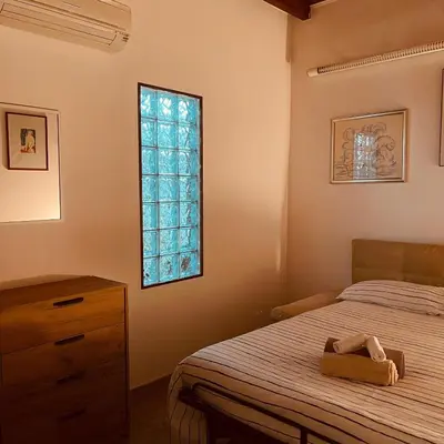 Letto o letti in una camera di Fontana Suite Iglesias