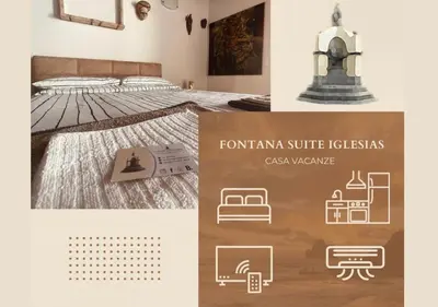 Letto o letti in una camera di Fontana Suite Iglesias
