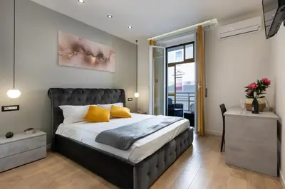 Letto o letti in una camera di Daddi rooms & apartment