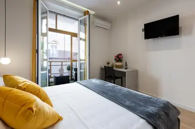 Letto o letti in una camera di Daddi rooms & apartment