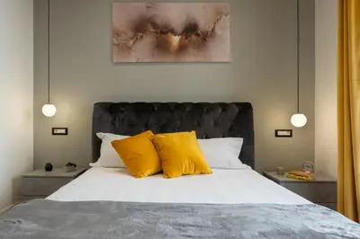 Letto o letti in una camera di Daddi rooms & apartment