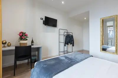 Letto o letti in una camera di Daddi rooms & apartment