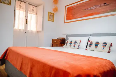 Letto o letti in una camera di Casetta Zia Maria
