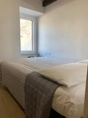 Letto o letti in una camera di IL GINEPRO house