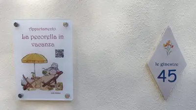 Certificato, attestato, insegna o altro documento esposto da La pecorella in vacanza IUN R3384