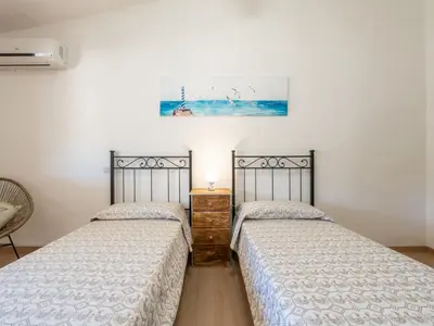 Letto o letti in una camera di Apartment Il Faro Blu by Interhome