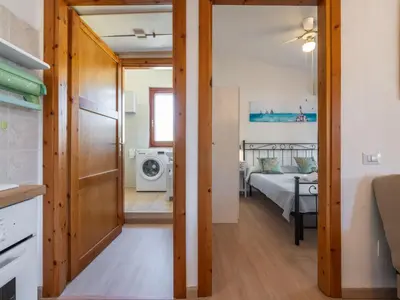 Letto o letti in una camera di Apartment Il Faro Blu by Interhome