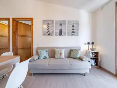 Area soggiorno di Apartment Il Faro Blu by Interhome