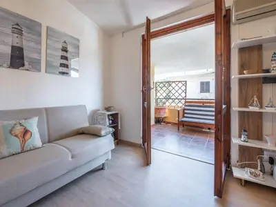Area soggiorno di Apartment Il Faro Blu by Interhome