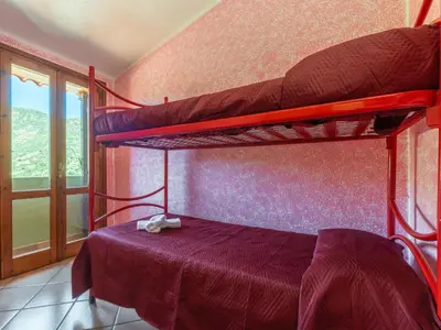 Letto o letti in una camera di Holiday Home Luli by Interhome