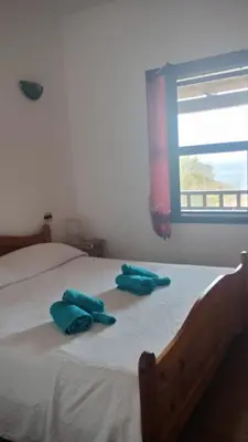 Letto o letti in una camera di Casa vacanze Torre dei corsari vista mare