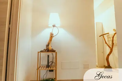 Letto o letti in una camera di DOMUS DEIANAS - two deluxe apartments in Cagliari