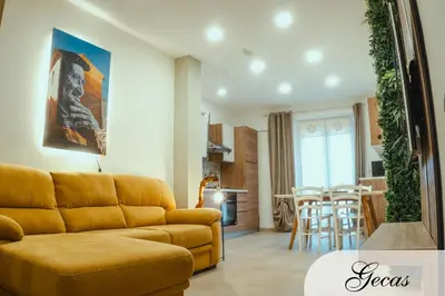 Area soggiorno di DOMUS DEIANAS - two deluxe apartments in Cagliari