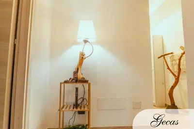 Letto o letti in una camera di DOMUS DEIANAS - two deluxe apartments in Cagliari