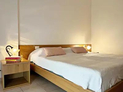 Letto o letti in una camera di Le Tre Sorelle