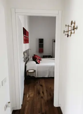 Letto o letti in una camera di Palazzo Ma.Ri.Lu.