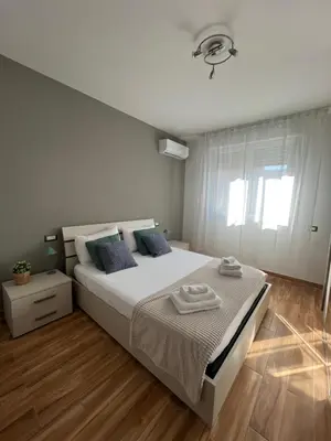Letto o letti in una camera di Welcome Home Quartu Sant'Elena
