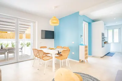 TV o dispositivi per l'intrattenimento presso Oltremare, Patio, two steps from the sea