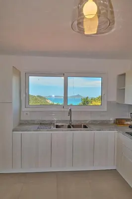 Cucina o angolo cottura di Stunning sea View Villa w/private Pool - 5 Minutes From the Beach!