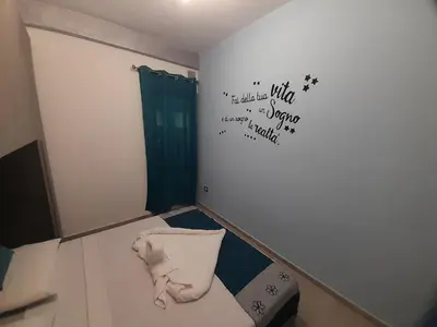 Letto o letti in una camera di SOLE E MARE VILLASIMIUS Codice IUN R1681
