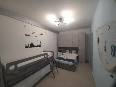 Letto o letti in una camera di SOLE E MARE VILLASIMIUS Codice IUN R1681