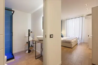 Letto o letti in una camera di Daddi rooms & apartment
