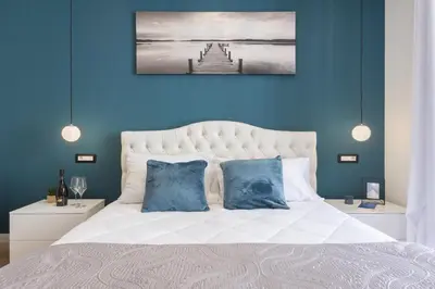 Letto o letti in una camera di Daddi rooms & apartment