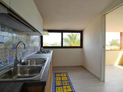Cucina o angolo cottura di Apartment on Costa Rei with Stunning Beaches