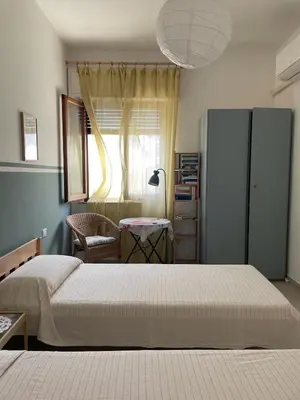 Letto o letti in una camera di Casa Belvedere - La Terrazza sul Mare