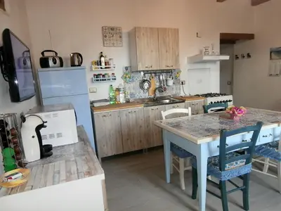 Cucina o angolo cottura di Il Rifugio del vecchio Bandito
