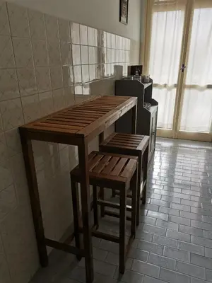Cucina o angolo cottura di Casa San Saturnino appartamento 8 posti Cagliari centro