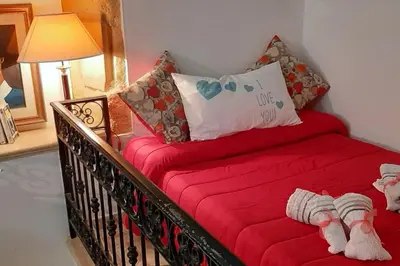 Letto o letti in una camera di Cagliari Centro