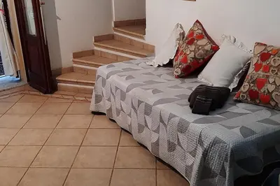 Letto o letti in una camera di Cagliari Centro