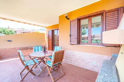 Balcone o terrazza di Costa Rei - spiaggia 3' a piedi - Giardino BBQ