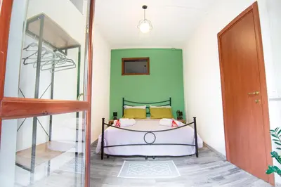 Letto o letti in una camera di Oisum Home