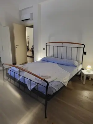 Letto o letti in una camera di A casa di Anna e Mario