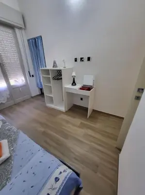 Letto o letti in una camera di A casa di Anna e Mario