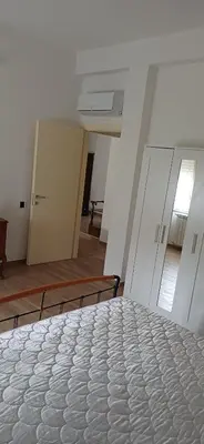 Letto o letti in una camera di A casa di Anna e Mario