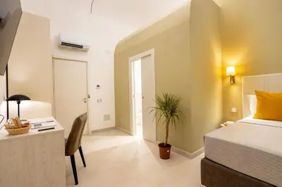 Letto o letti in una camera di Magnini Rooms
