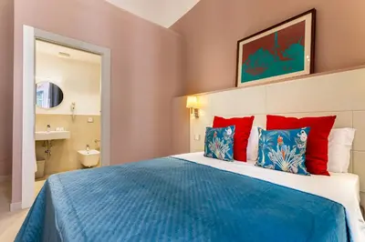 Letto o letti in una camera di Magnini Rooms