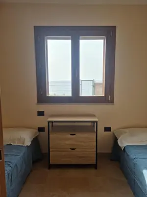 Letto o letti in una camera di Arbus dune e mare