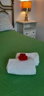 Letto o letti in una camera di Sa Prenda E Oro