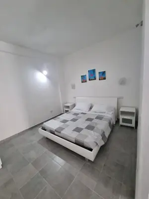 Letto o letti in una camera di Mito apartment